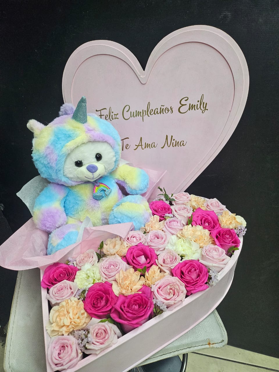 Oso de peluche con flores