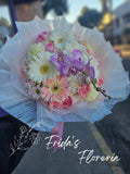 Gerberas y una orquidea
