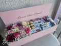 Caja de rosas con chocolates