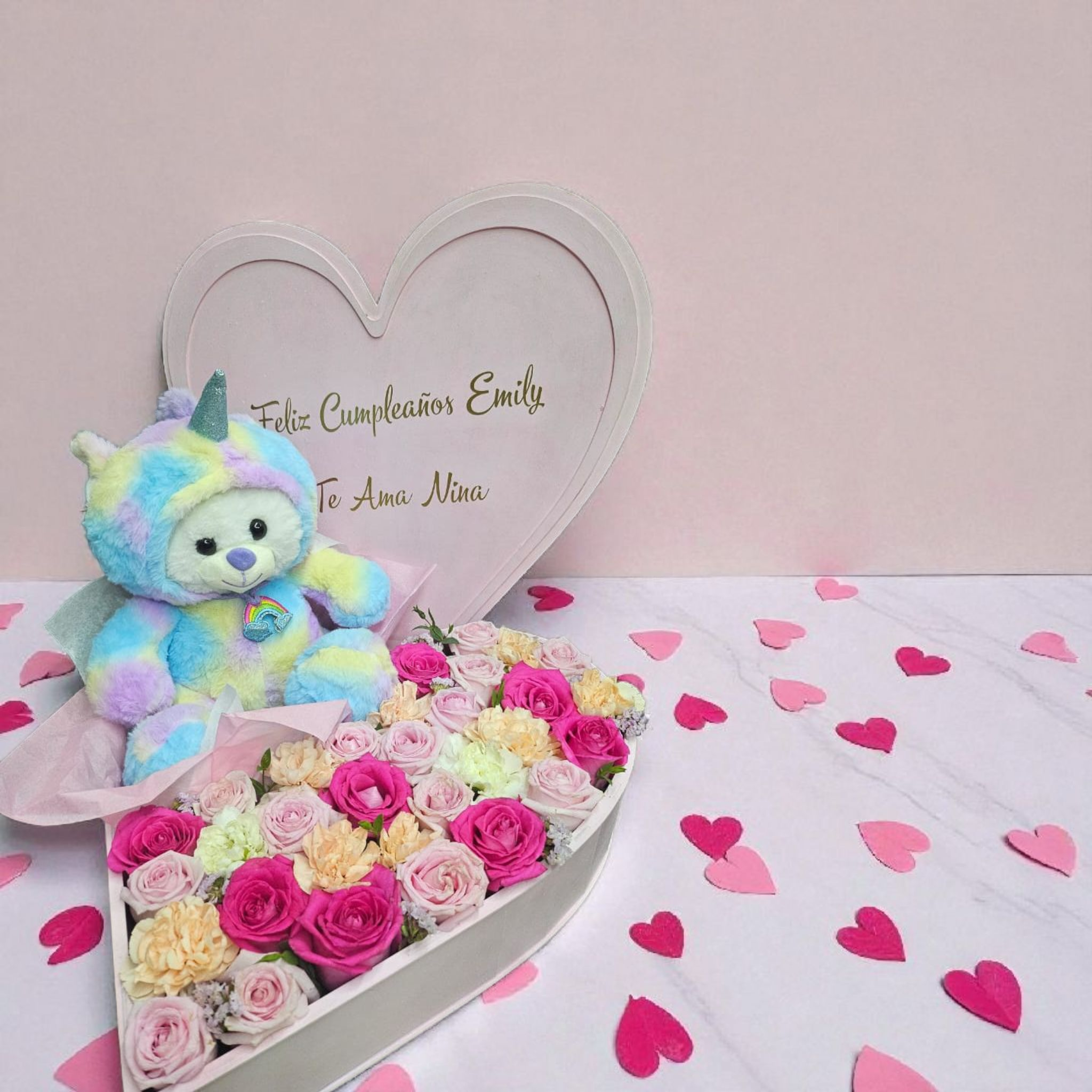 Oso de peluche con flores