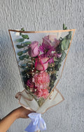Rosas en celofán