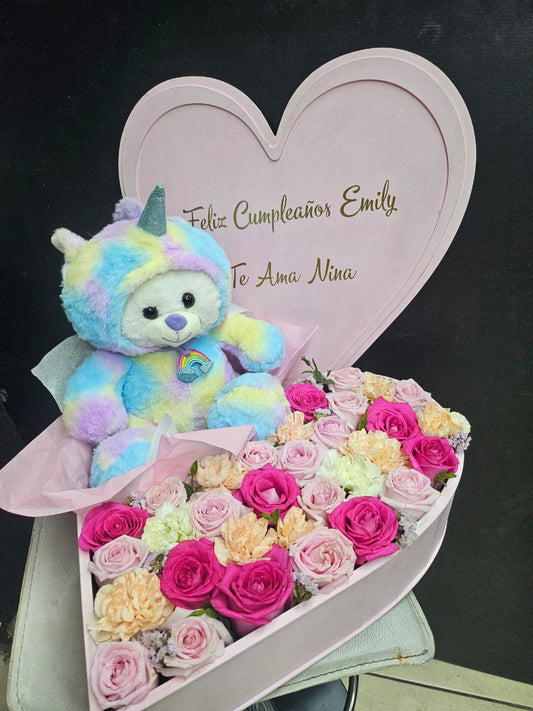 Oso de peluche con flores