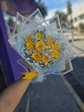 Decena de rosas amarillas